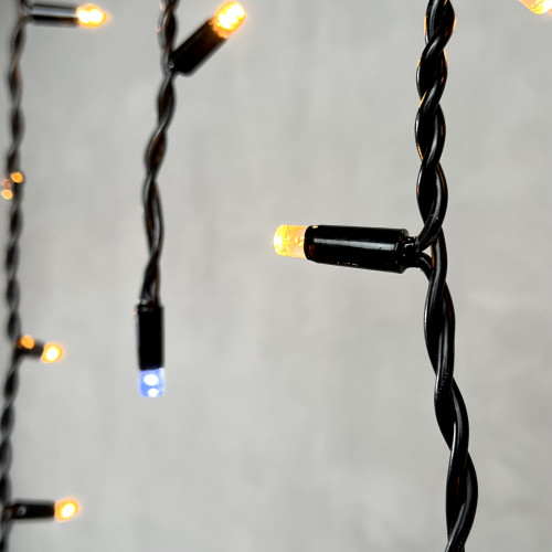 Светодиодная бахрома с колпачком 3,1*0,5 м., 120 экстра теплых белых LED ламп, мерцание, каучуковый черный провод, LTC (LL120BLW-1-2EWW)