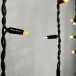 Светодиодная бахрома с колпачком 3,1*0,5 м., 120 желтых белых LED ламп, мерцание, каучуковый черный провод, LTC (LL120BLW-1-2Y)