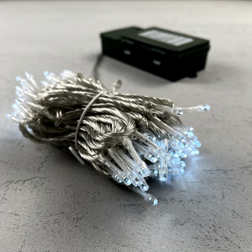 Светодиодная гирлянда 10 м., 3 батарейки типа D 4.5V, 100 LED ламп холодного белого цвета, таймер, прозрачный провод, LTC (EST100-4W10-8W)