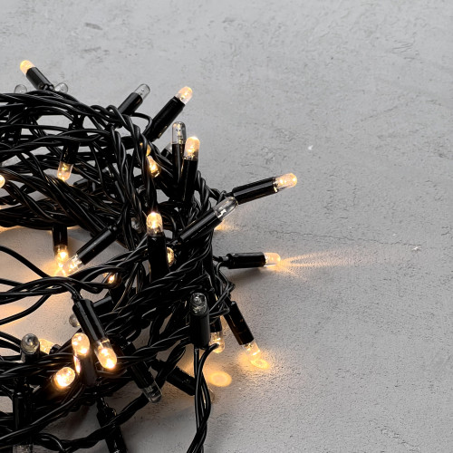 Светодиодная гирлянда с колпачком 100 теплых белых LED ламп 10 м., мерцание каждого диода, 24В., черный провод ПВХ, IP65, LTC (PST100ABLCAP-11-1WW)