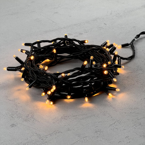 Светодиодная гирлянда с колпачком 75 экстра теплых белых LED ламп 10 м., 24В., черный каучуковый провод, IP65, LTC (LL75-1-1EWW)