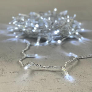 Светодиодная гирлянда с колпачком 100 холодных белых LED ламп 10 м., 220-230 В., прозрачный провод ПВХ, IP65, LTC (PST100CAP-10-2W)
