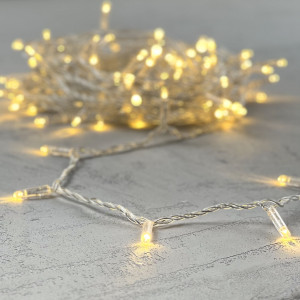 Светодиодная гирлянда с колпачком 100 экстра теплых белых LED ламп 10 м., 220-230 В., прозрачный провод ПВХ, IP65, LTC (PST100CAP-10-2WW)