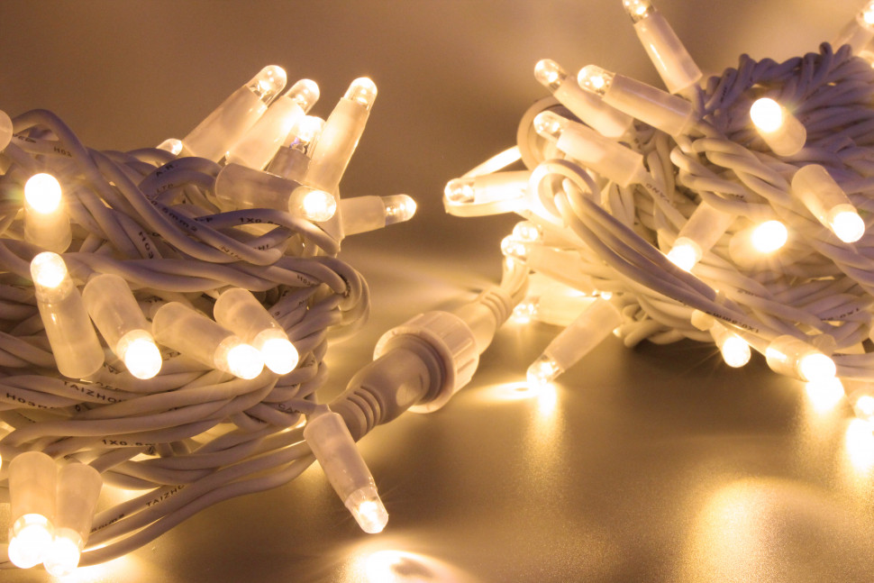 Светодиодная нить 100 теплых белых LED ламп, 10 м., 220В, статика, белый резиновый провод, Teamprof (TPF-S10C-220V-RW/WW)