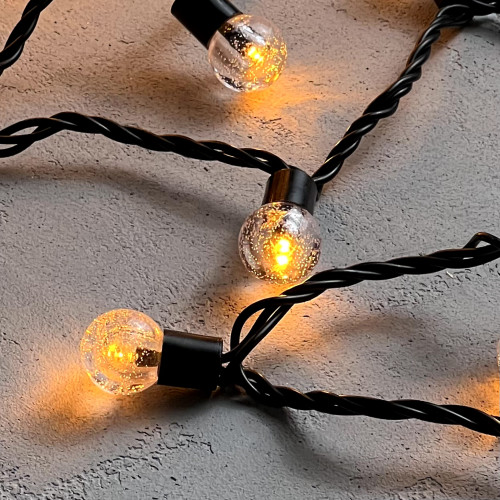 Светодиодная гирлянда шарики Пузырьки 10 м., 220V., 100 желтых LED ламп 23 мм., коннектор, черный ПВХ, LTC (PCS-100B-Y)