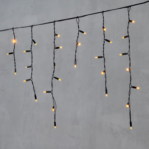 Светодиодная бахрома с колпачком 3,1*0,5 м., 120 экстра теплых белых LED ламп, черный провод ПВХ, IP65, LTC (PIL120CAP-11-2EWW)