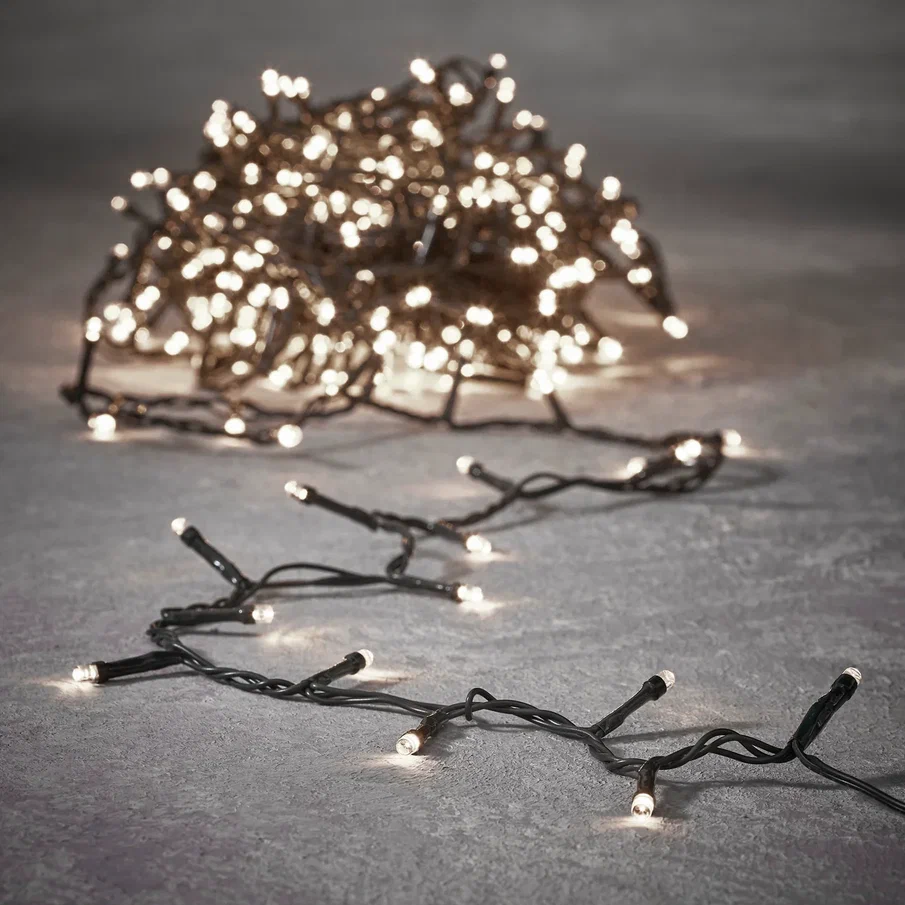 Светодиодная нить String Light 368 теплых ламп, 27.6 м., на батарейках, таймер, зеленый провод, Luca (83791)