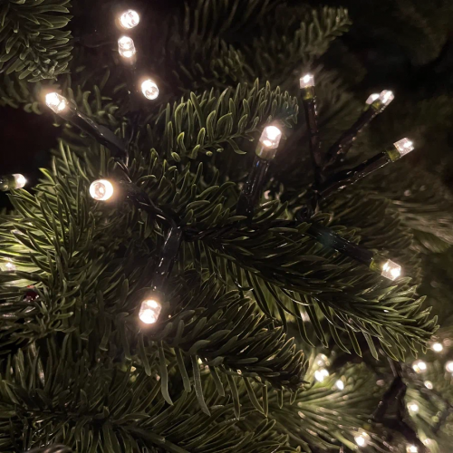 Светодиодная нить Snake Light 700 теплых белых ламп, 14 м., 24В, 8 режимов, зеленый провод, для елки 215 см., Christmas DeLuxe (83782)