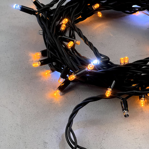 Гирлянда Нить 10 м., Желтая с Мерцанием Белого Диода 220В, 75 LED, Провод Черный Каучук, IP65, LTC (LL75BLW-1-2Y) 