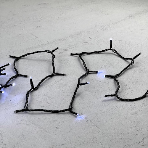 Светодиодная нить 100 холодных белых LED ламп с мерцанием каждого диода, 10 м., 24В., черный провод ПВХ, Beauty Led (PST100ABL-11-1W)